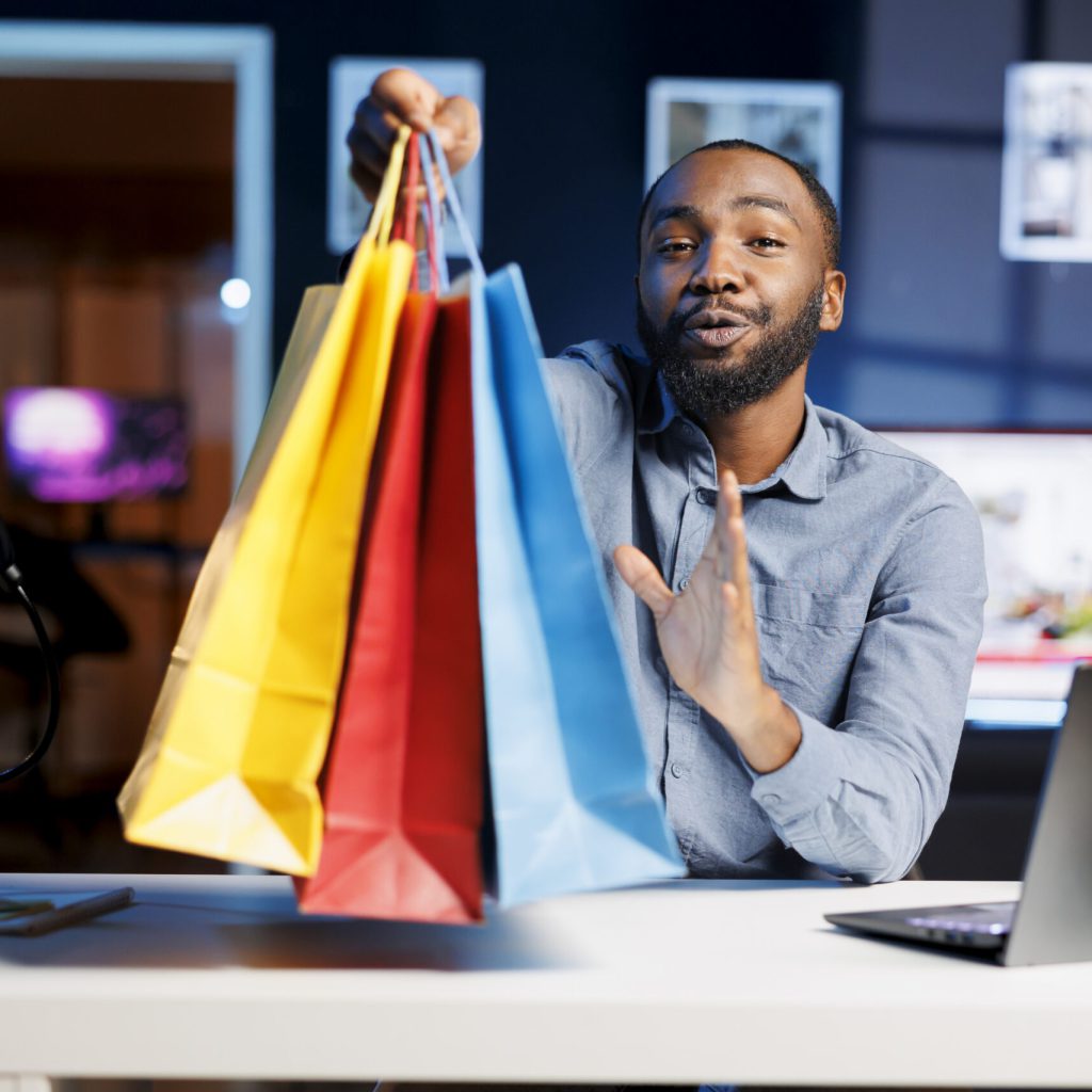 fashion influencer holding shopping bags scaled.jpg