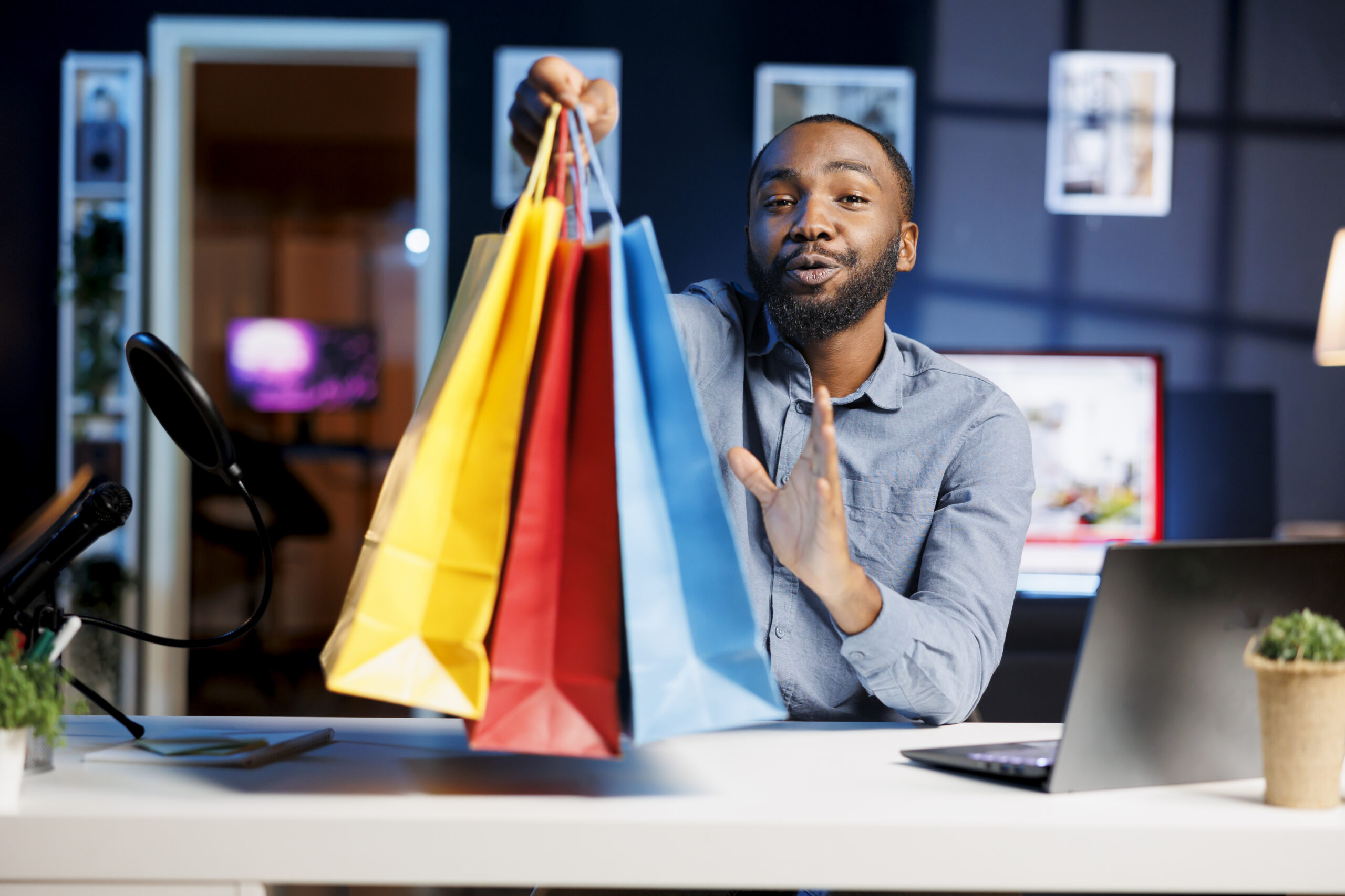 fashion influencer holding shopping bags scaled.jpg